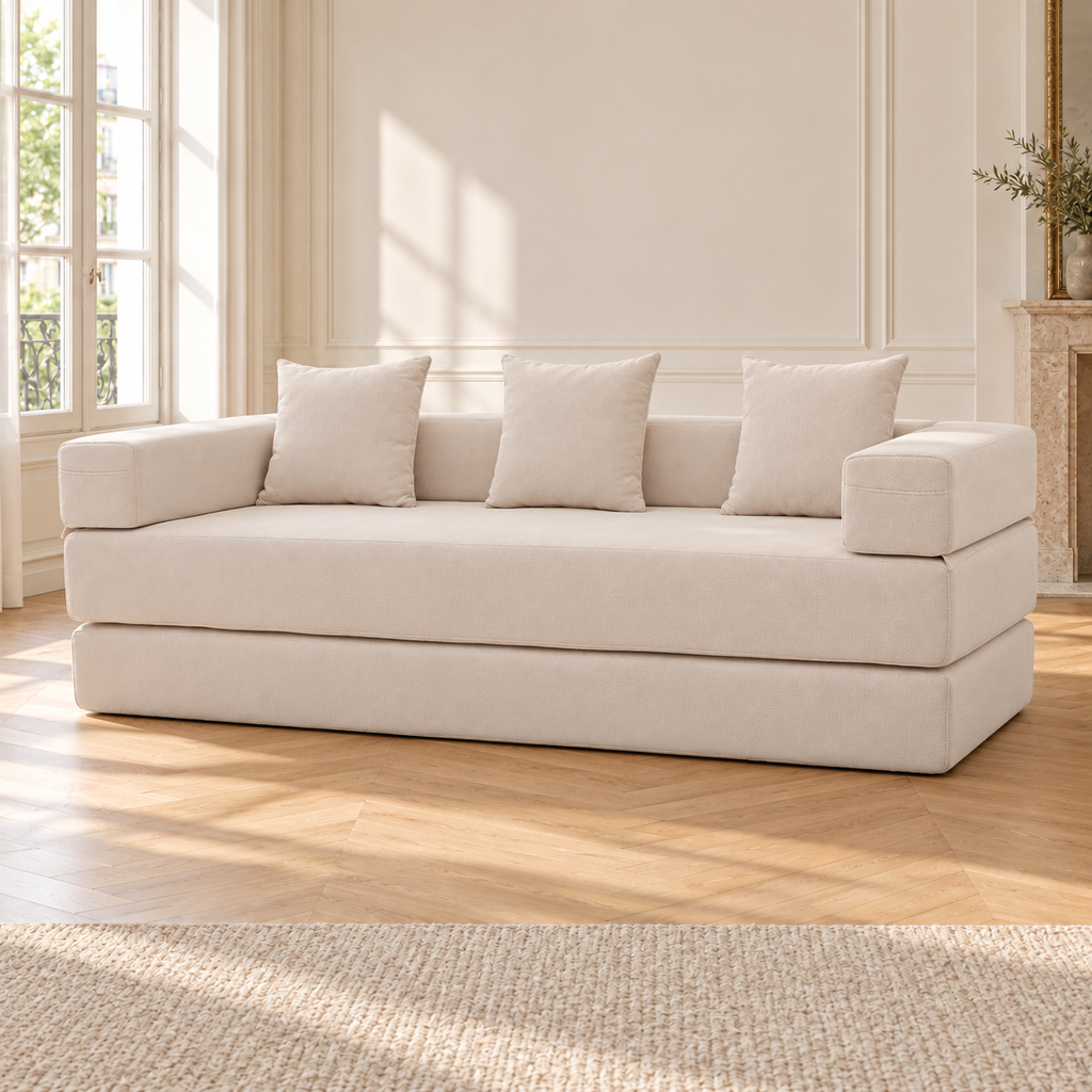 Canapé convertible en chenille crème, vue de trois quarts