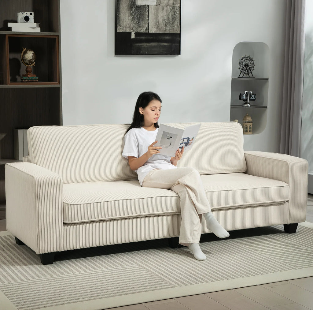 Canapé 3 places en tissu côtelé crème de 227 cm, assise en situation
