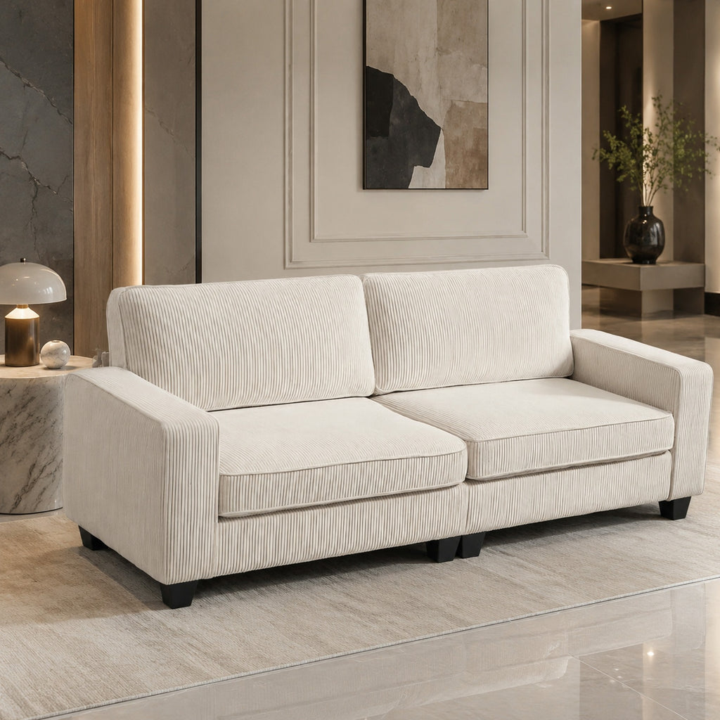 Canapé 3 places en tissu côtelé crème de 227 cm, vue latérale en situation