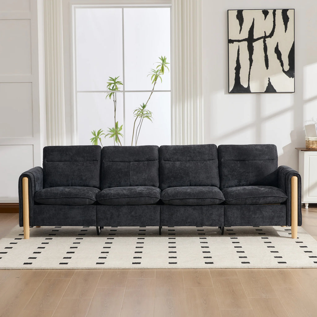 Canapé avec pouf en tissu et pieds en bois, dans un salon