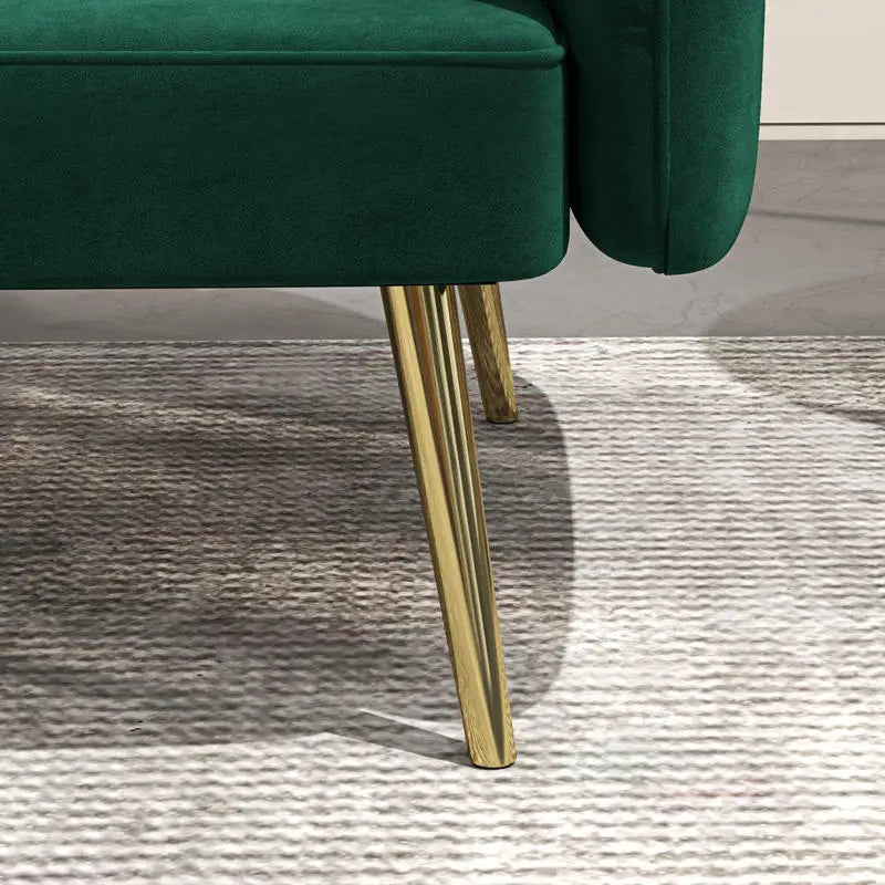 Canapé clic-clac en velours vert à pieds dorés, détail du pied doré