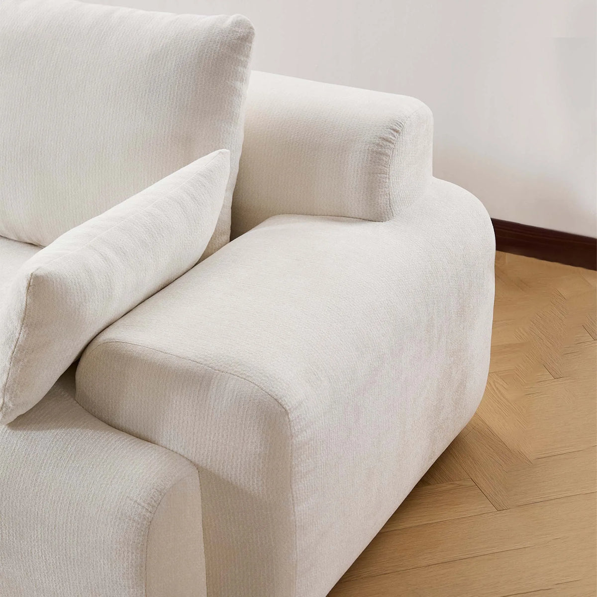 Canapé nuage blanc de 212 cm sans armature, détail latéral de l’assise