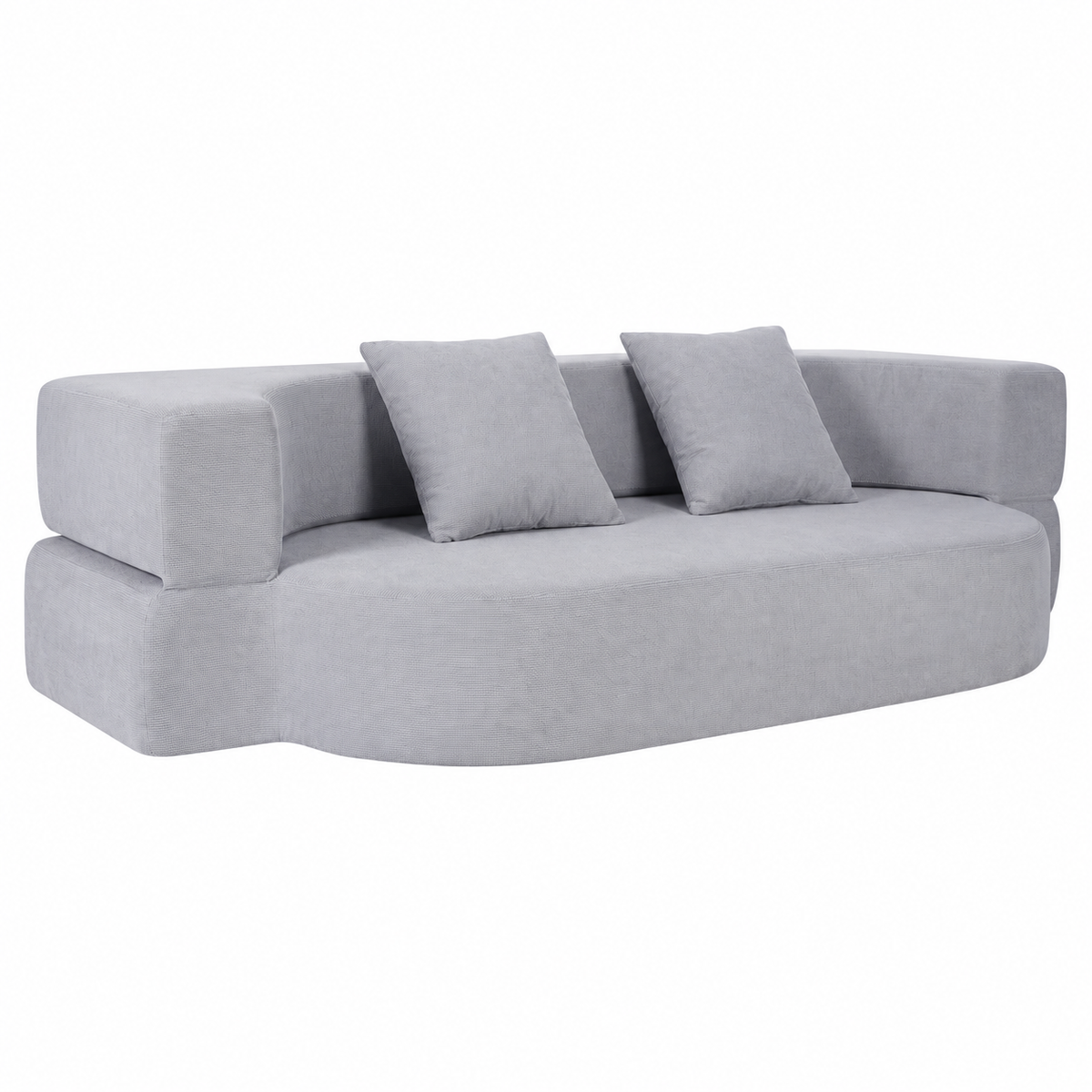 Canapé convertible arrondi gris avec deux coussins, position assise sur fond blanc