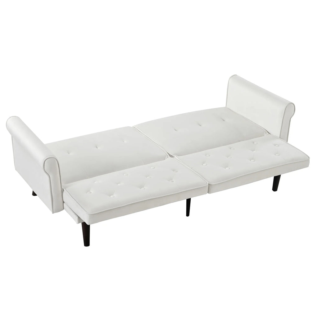 Canapé convertible beige capitonné, entièrement déplié en couchage