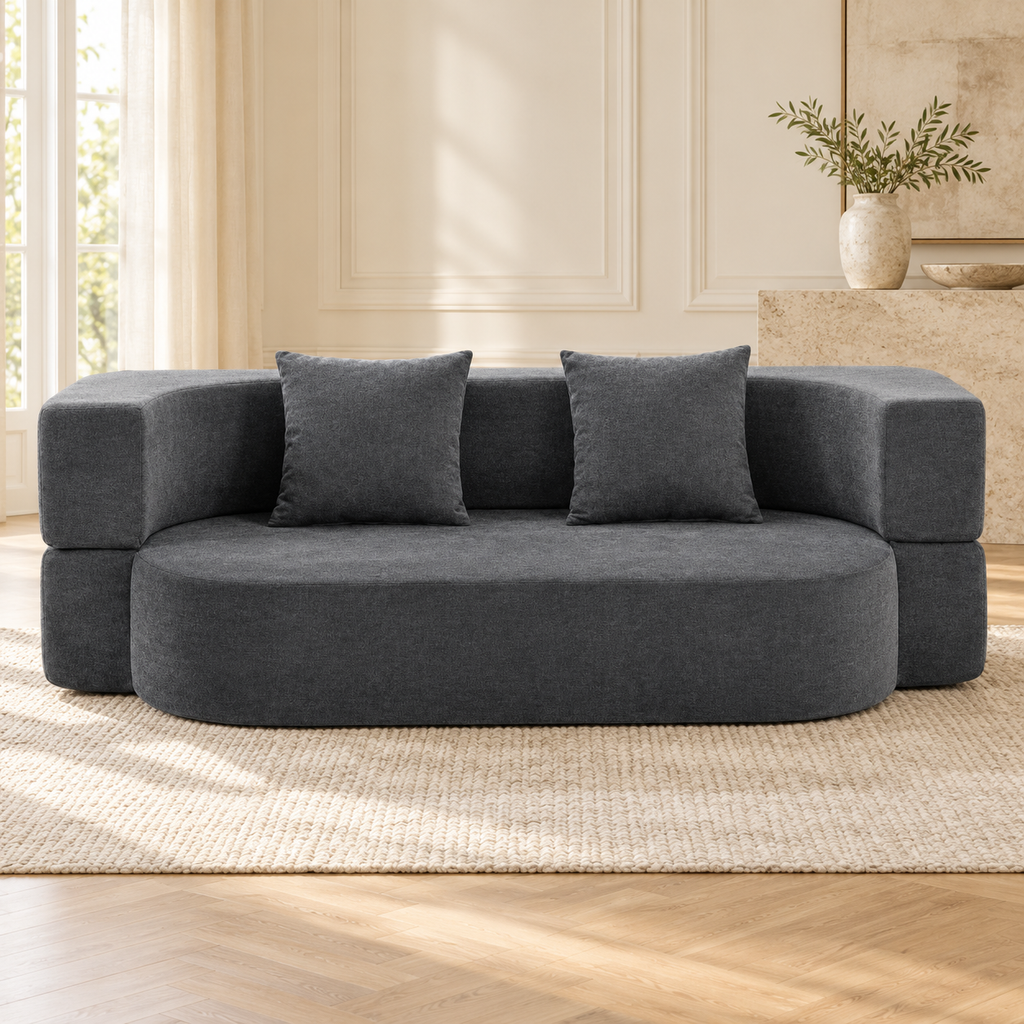 Canapé convertible gris en chenille, position assise, autre angle dans un salon lumineux