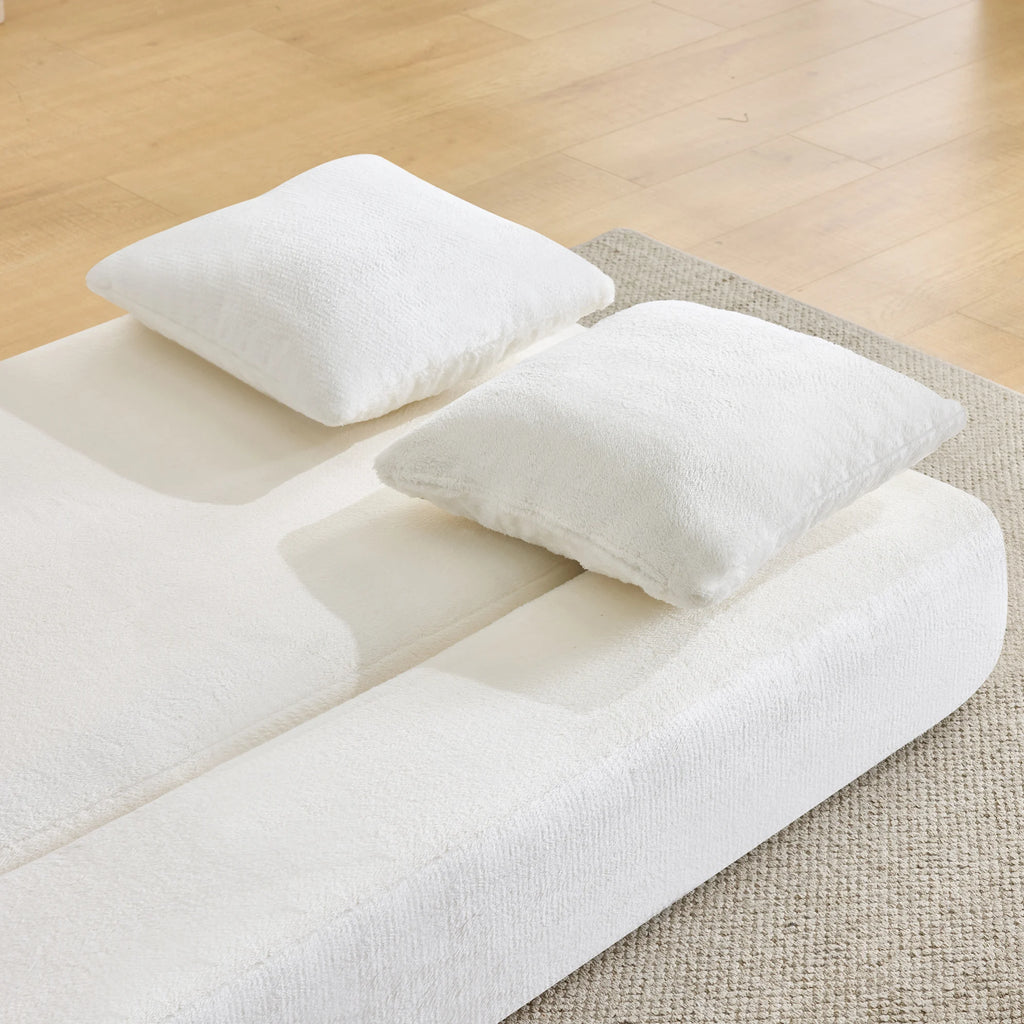 Canapé convertible pliable blanc crème, détail du couchage et des coussins