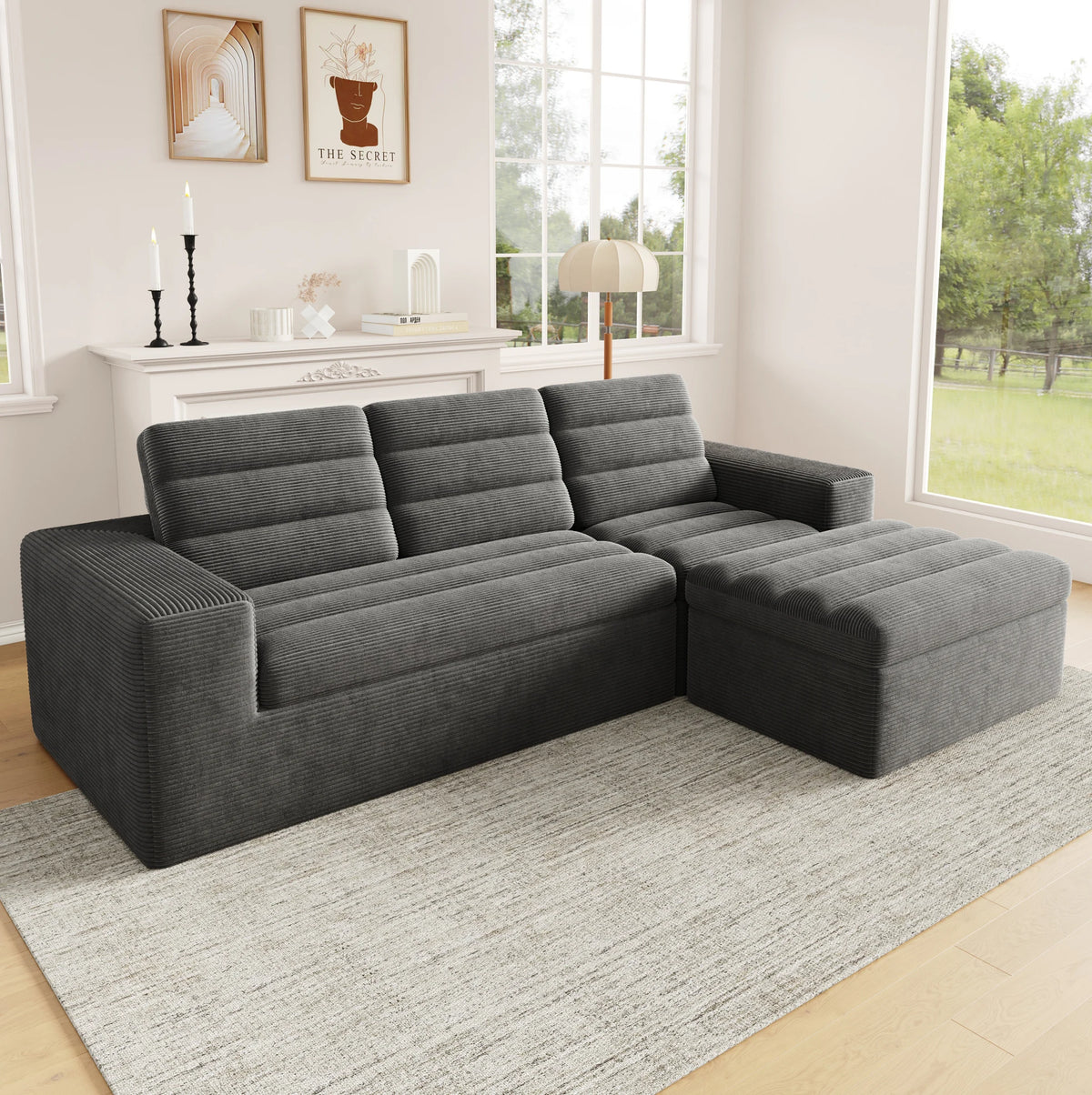 Canapé d'angle modulable en velours côtelé gris, avec pouf