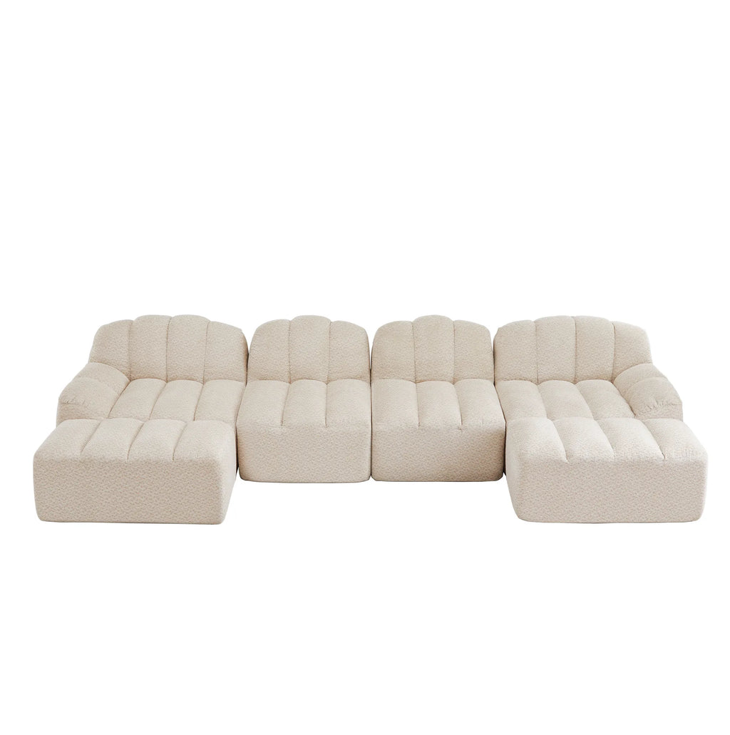 Canapé modulable à assises arrondies et deux poufs, ensemble crème sur fond blanc