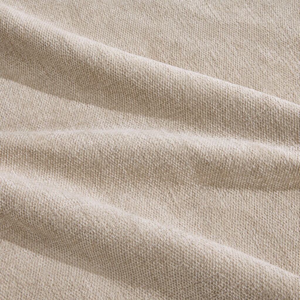 Canapé modulable beige avec deux poufs, détail du tissu beige
