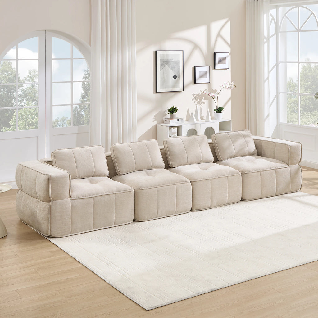 Canapé modulable capitonné, beige, dans un salon