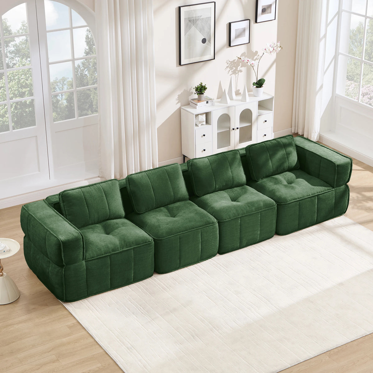Canapé modulable capitonné, vert, dans un salon