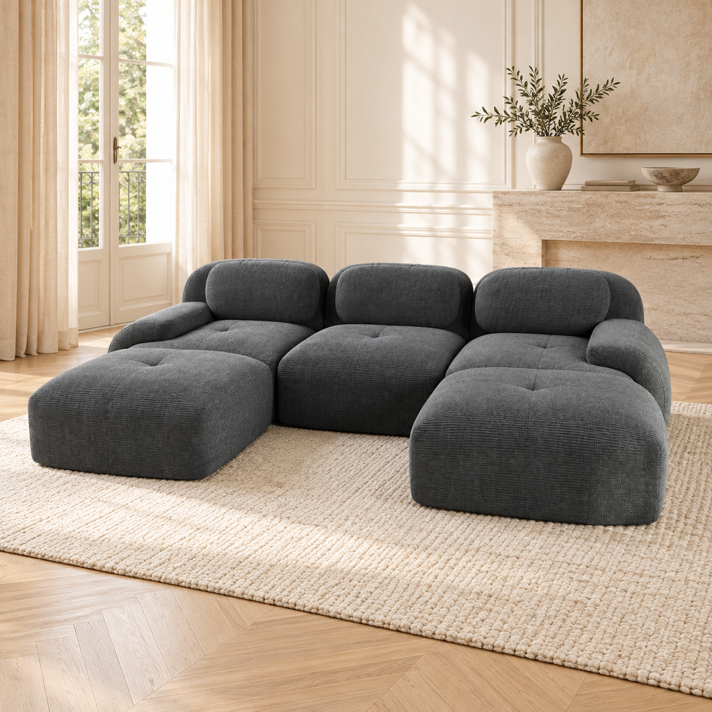 Canapé modulable en velours côtelé gris, autre angle dans un salon lumineux