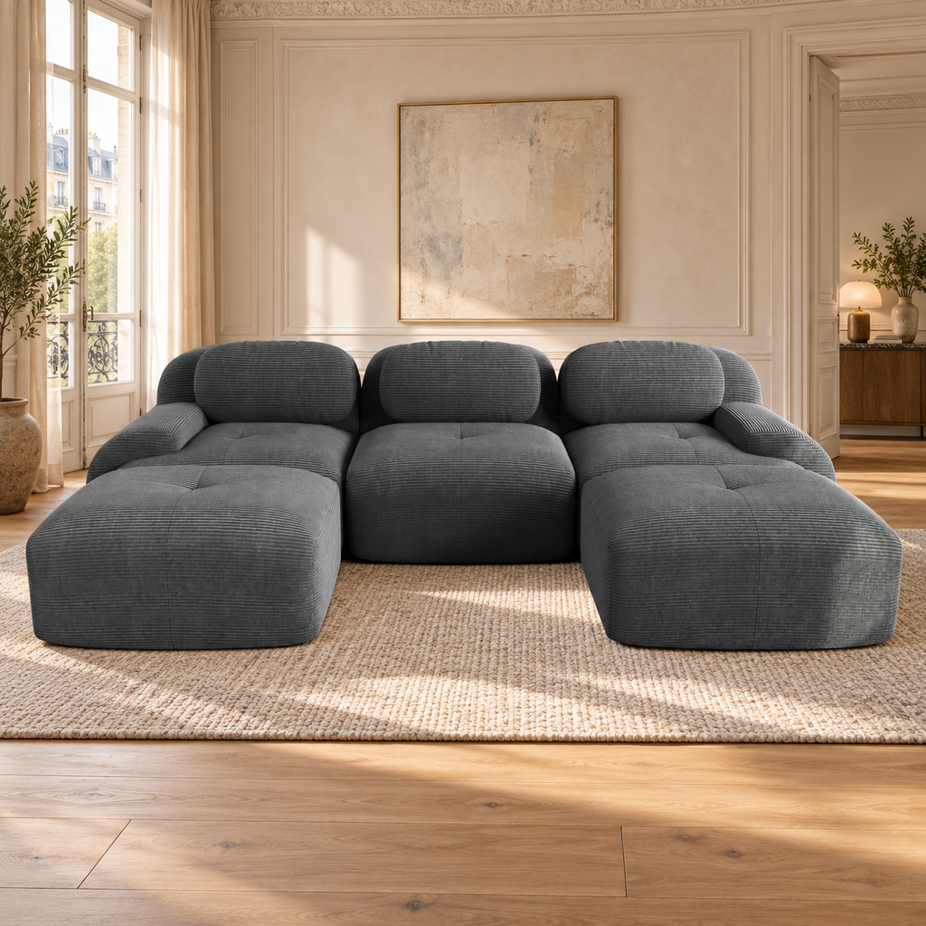 Canapé modulable en velours côtelé gris, ensemble dans un salon lumineux