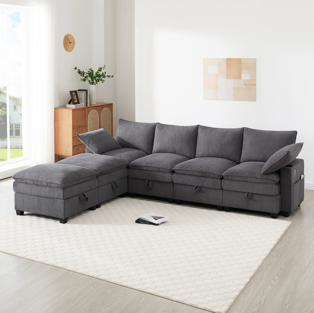 Canapé modulable gris avec rangement, dans un salon