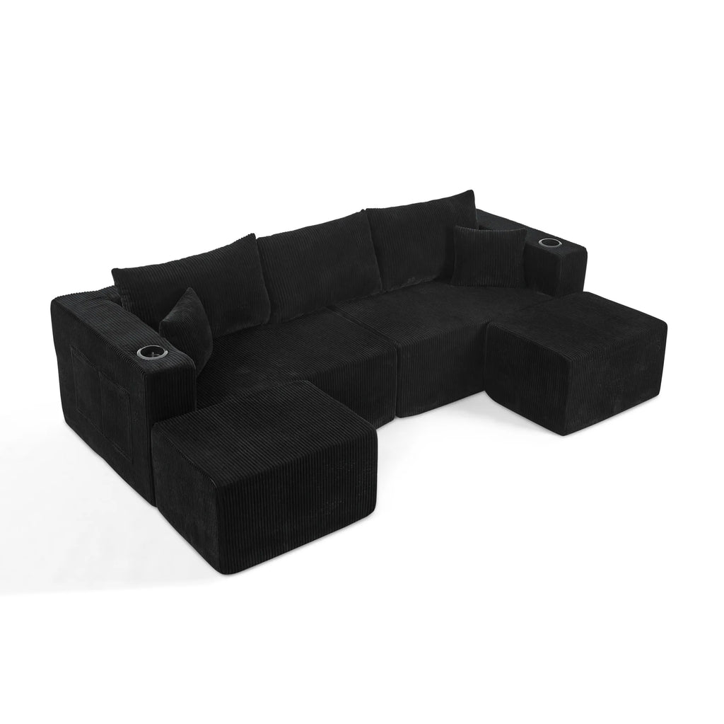 Canapé modulaire noir en velours côtelé à poufs mobiles, sur fond blanc