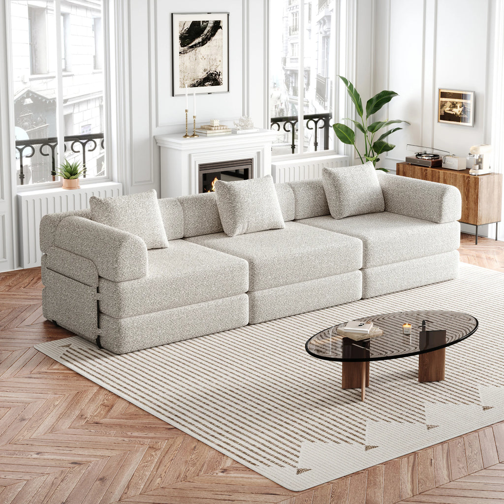 Canapé modulaire trois places en chenille, kaki clair, dans un salon