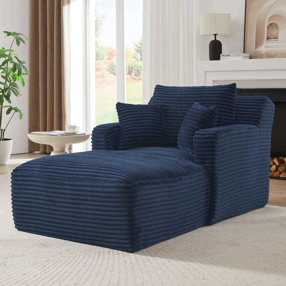 Chaise longue en velours côtelé à larges côtes, bleu, dans un salon
