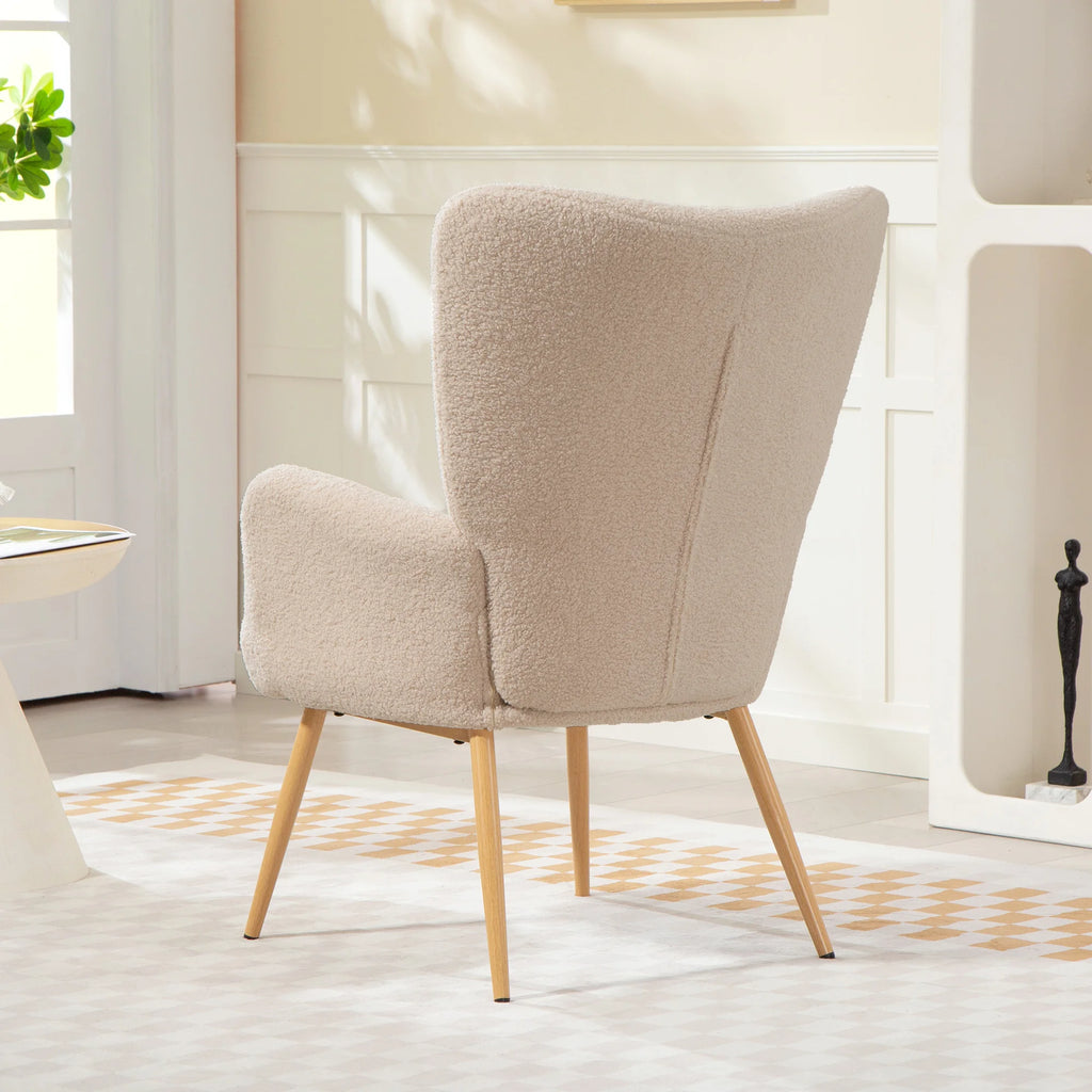 Fauteuil beige à oreilles, vue arrière en situation