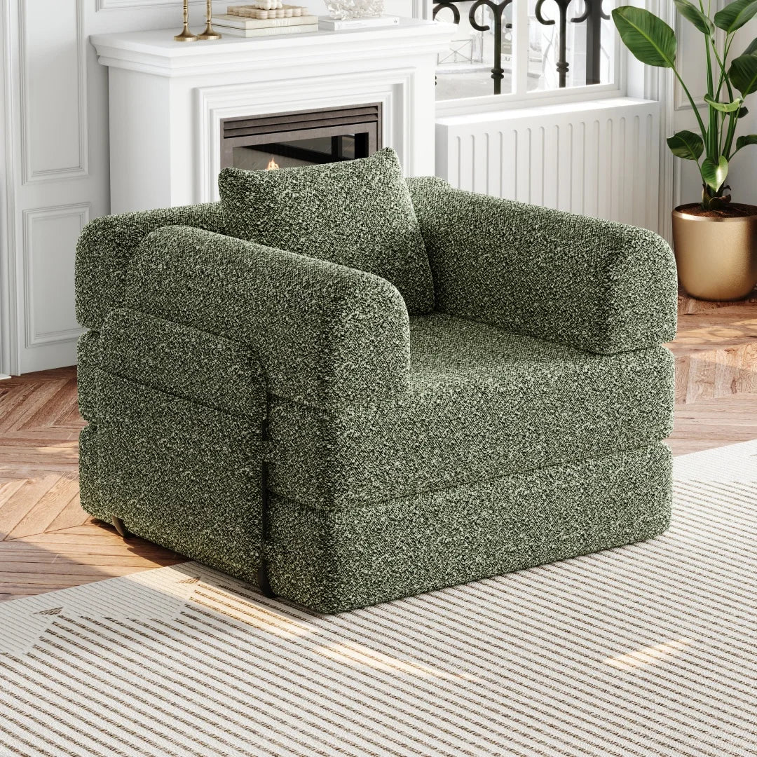 Fauteuil convertible vert en chenille avec accoudoirs, fermé, vue de trois quarts en situation