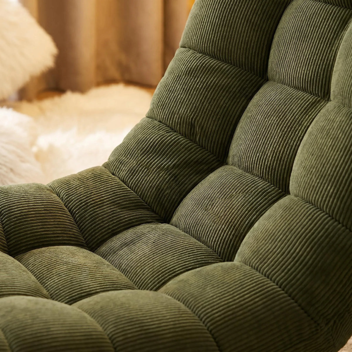 Fauteuil de relaxation en velours côtelé, vert, gros plan du tissu