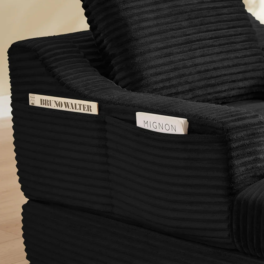 Fauteuil et repose-pieds modulables en velours côtelé noir, détail de la poche latérale