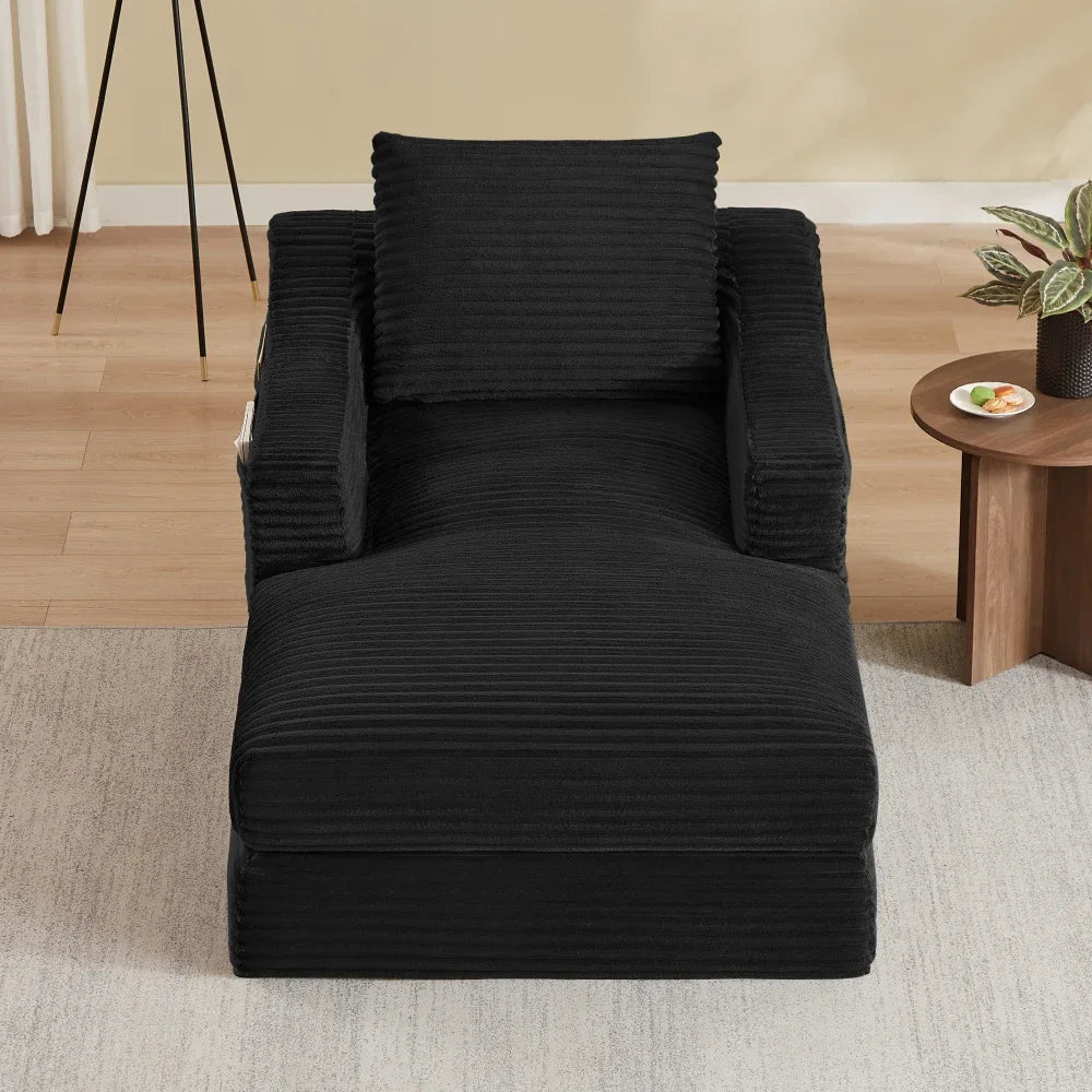 Fauteuil et repose-pieds modulables en velours côtelé noir, fauteuil seul vu de face