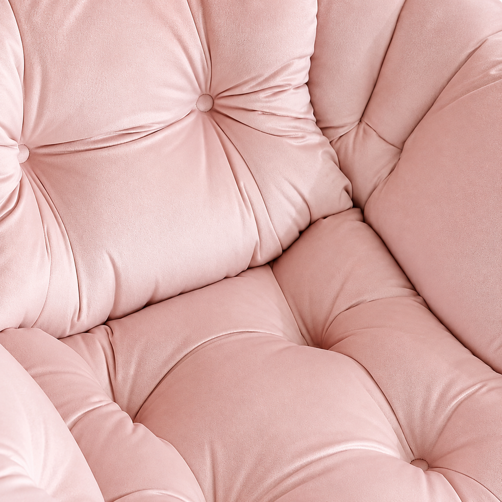 Fauteuil relax rose en velours avec repose-pieds, détail du coussin et du velours rose