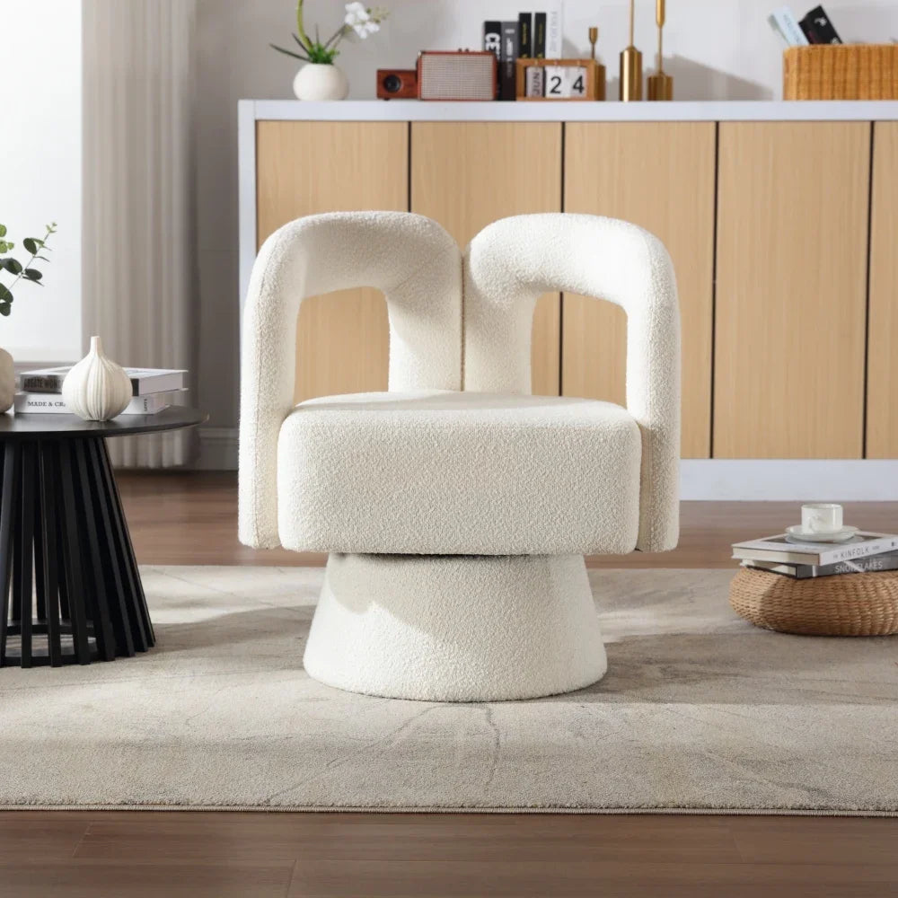 Fauteuil rond pivotant en tissu bouclé, beige, dans un salon