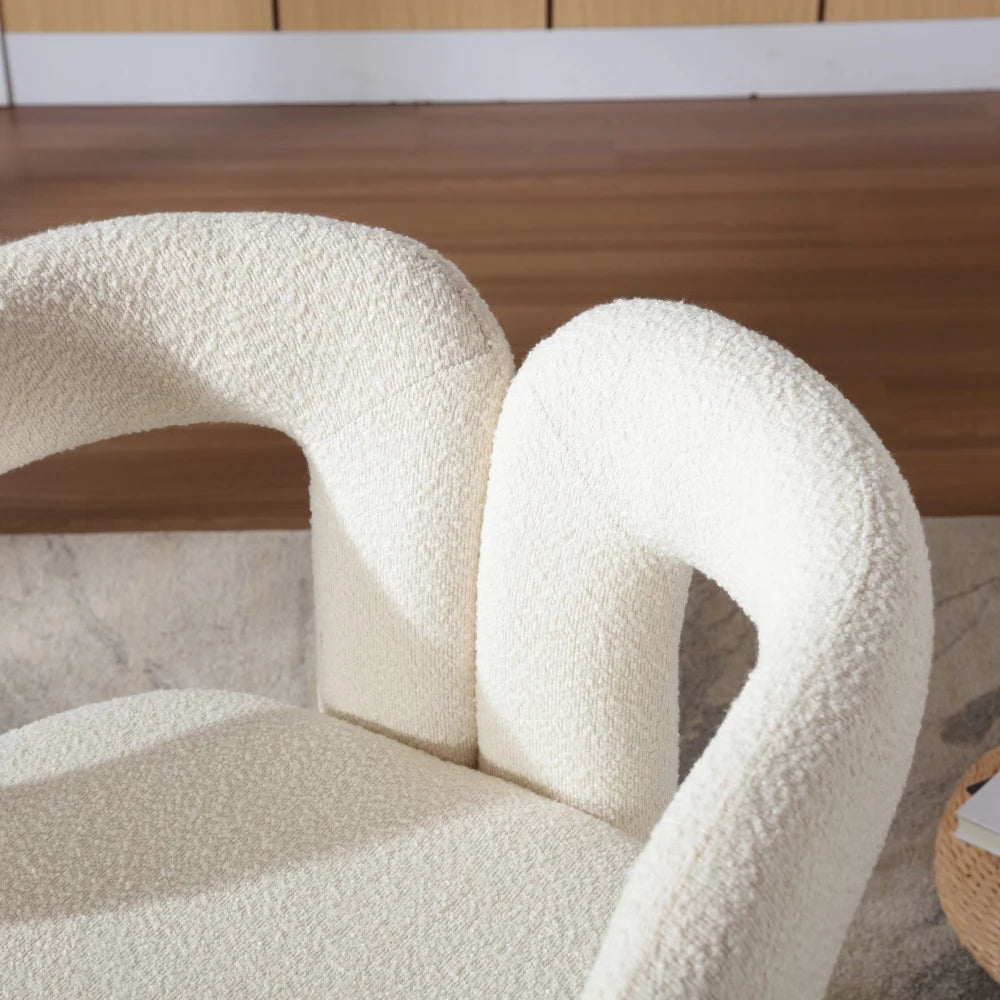 Fauteuil rond pivotant en tissu bouclé, beige, détail de l’accoudoir